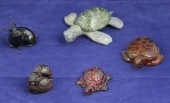 A carved hardstone figure of a