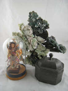 A carved hardstone floral display