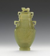 A Carved Hardstone Vase with L