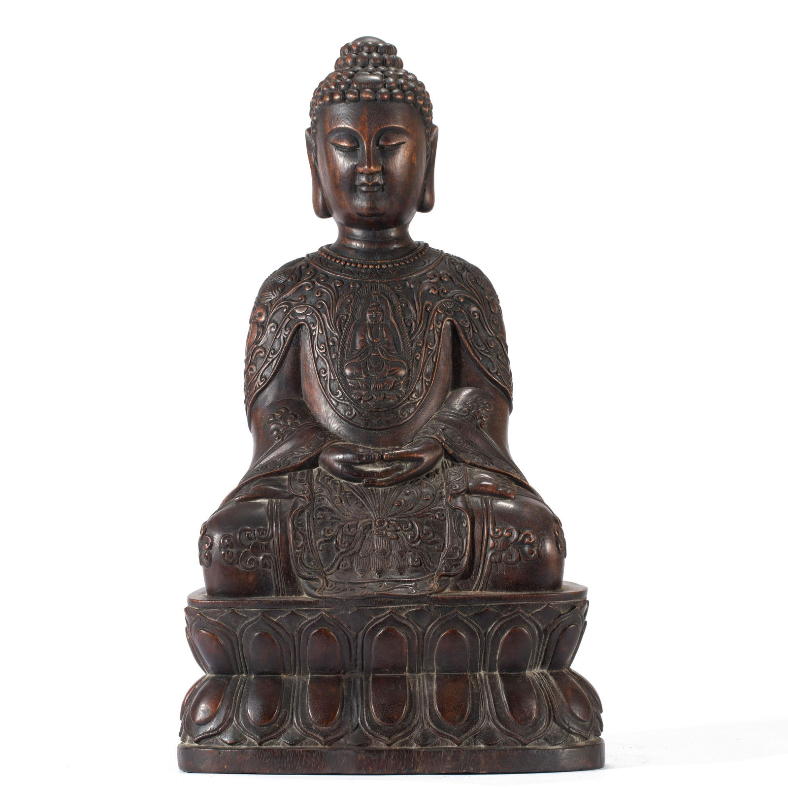 A CARVED HARDWOOD SEATED FIGURE
