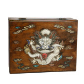 A CARVED HARDWOOD SQUARE DRAGO