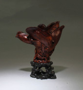 A CARVED HUANGHUALI FLOWER-SHA