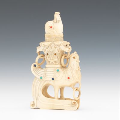 A Carved Ivory Bird Figural