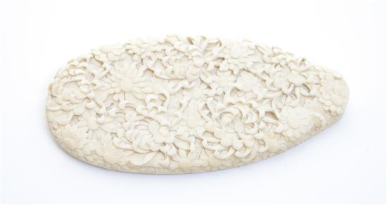 A Carved Ivory Brush Handle