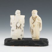 A Carved Ivory Couple with Bro