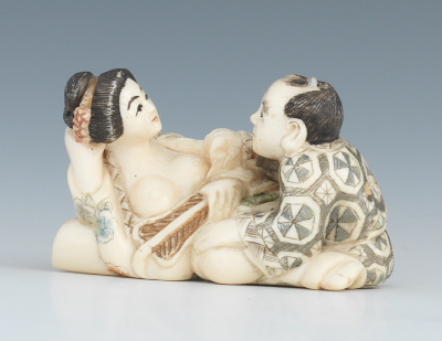 A Carved Ivory Erotic Netsuke