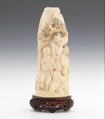 A Carved Ivory Figural Carved