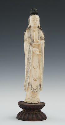 A Carved Ivory Figure of a