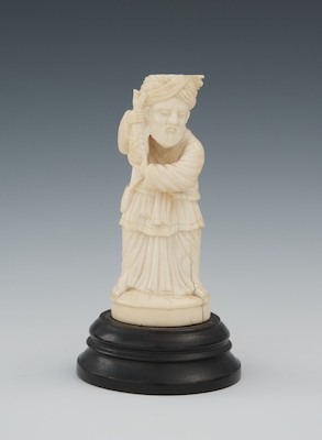 A Carved Ivory Figure of a