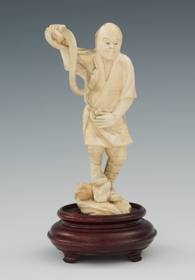 A Carved Ivory Figure of a Snake