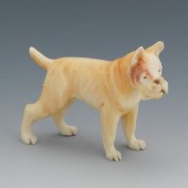 A Carved Ivory Figure of a Box