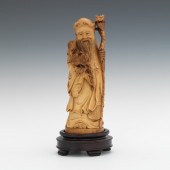 A Carved Ivory Figure of an Im