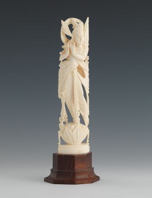 A Carved Ivory Figure of Krishna