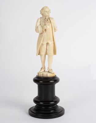 A carved ivory figure of Louis XVI,