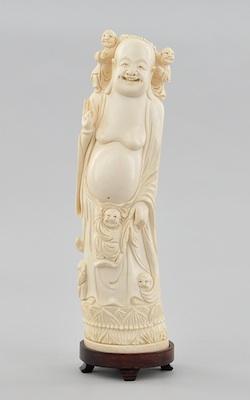 A Carved Ivory Figure of Budai with