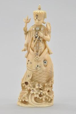 A Carved Ivory Grouping of the