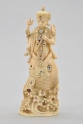 A Carved Ivory Grouping of the