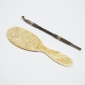 A Carved Ivory Hand Mirror, Si