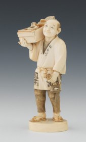 A Carved Ivory Japanese Figure