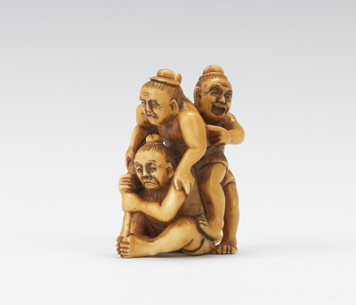 A Carved Ivory Netsuke Carved