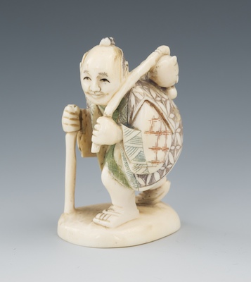 A Carved Ivory Netsuke of a