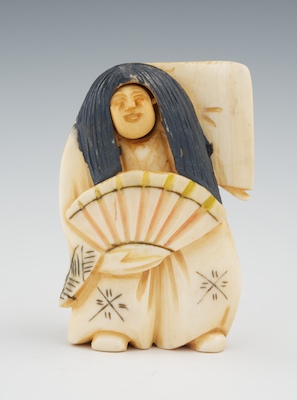 A Carved Ivory Netsuke of a Demon
