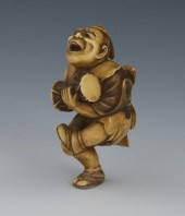 A Carved Ivory Netsuke of a Mu