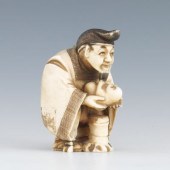 A Carved Ivory Netsuke of a Ma