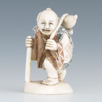 A Carved Ivory Netsuke of a