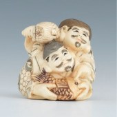 A Carved Ivory Netsuke of Fish