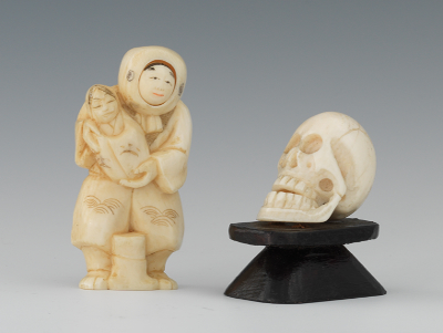 A Carved Ivory Netsuke Skull and