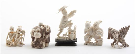 A Carved Ivory Okimono depicting