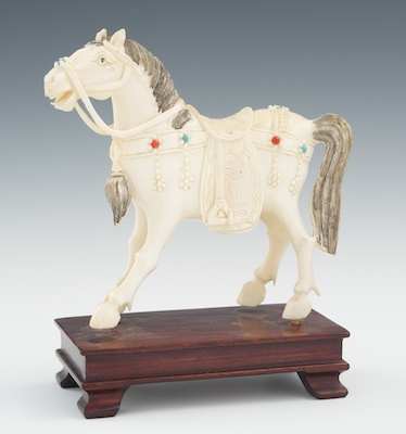 A Carved Ivory or Bone Horse on a