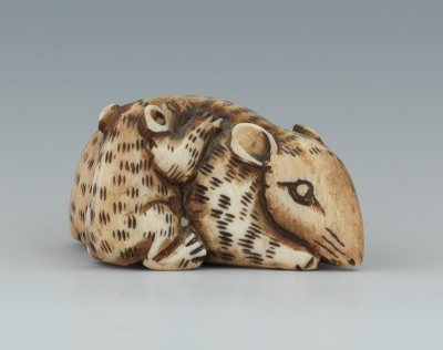 A Carved Ivory or Bone Netsuke of