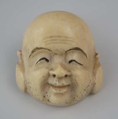 A Carved Ivory Portrait Brooch of