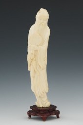 A Carved Ivory Scholar Standin