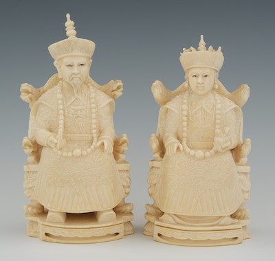A Carved Ivory Seated Emperor and