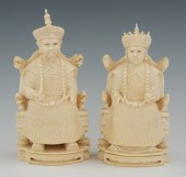 A Carved Ivory Seated Emperor