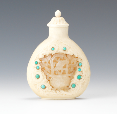 A Carved Ivory Snuff Bottle with