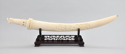 A Carved Ivory Sword Very unusual