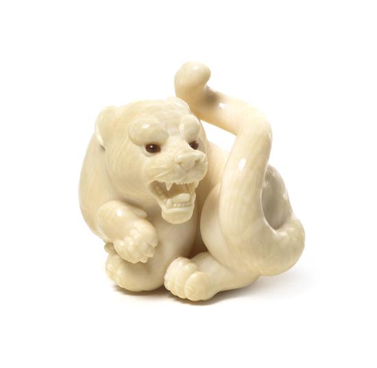 * A Carved Ivory Tiger Netsuke