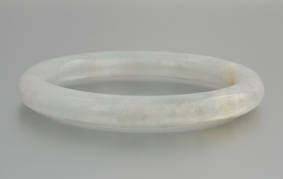 A Carved Jade Bangle Bracelet