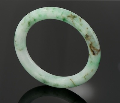 A Carved Jade Bangle Bracelet