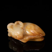 A CARVED JADE BOVINE<br>A CARV