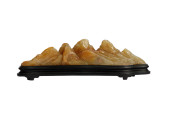 A CARVED JADE BRUSHREST<br>A C
