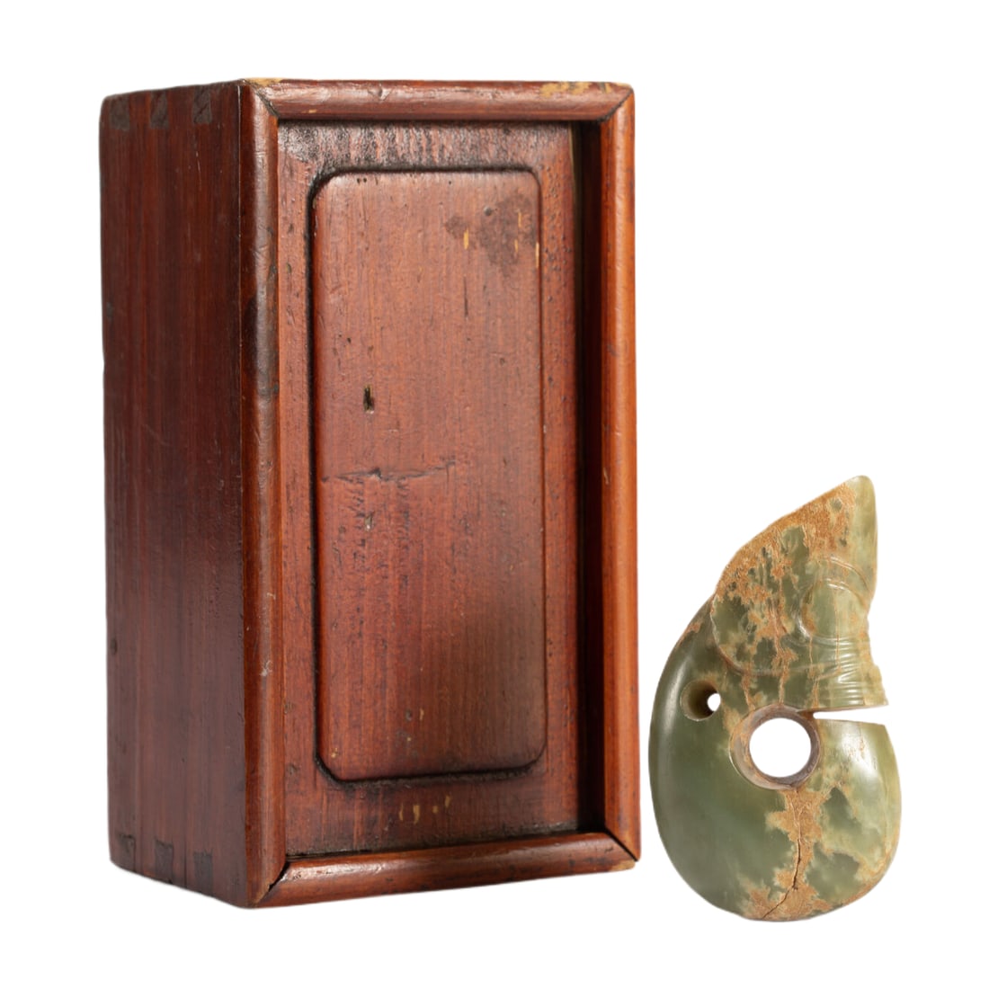 A CARVED JADE C-SHAPED DRAGONA