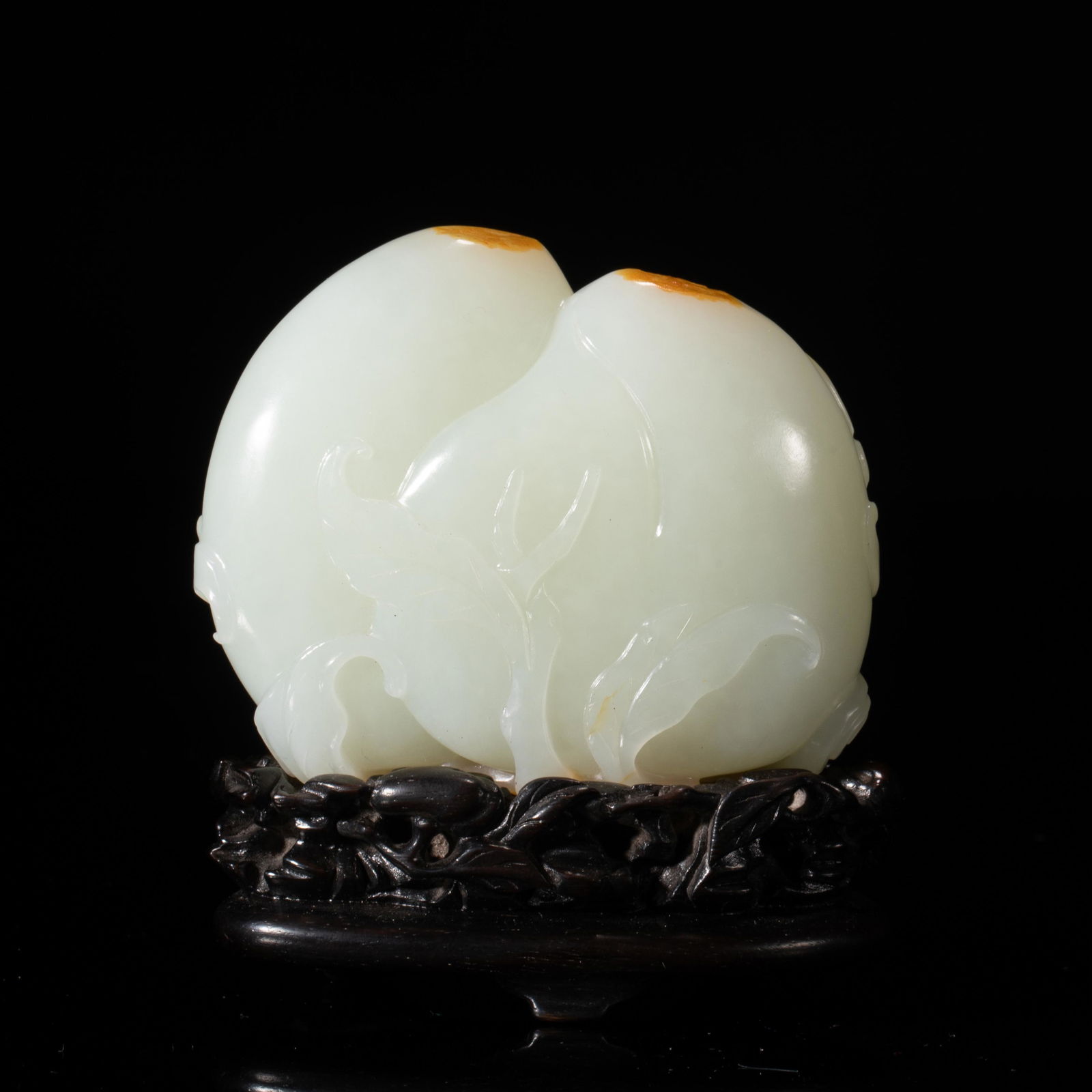 A CARVED JADE DECORATED OF PEACHESA