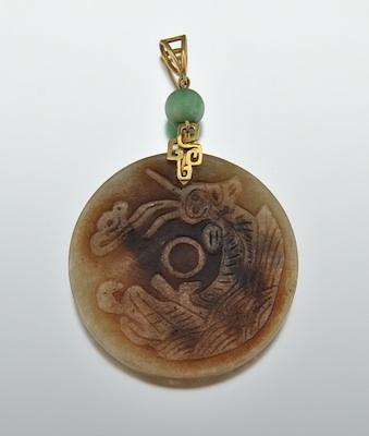 A Carved Jade Disk Pendant with 14k