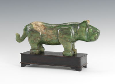 A Carved Jade Feline Carved jade