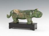 A Carved Jade Feline Carved ja